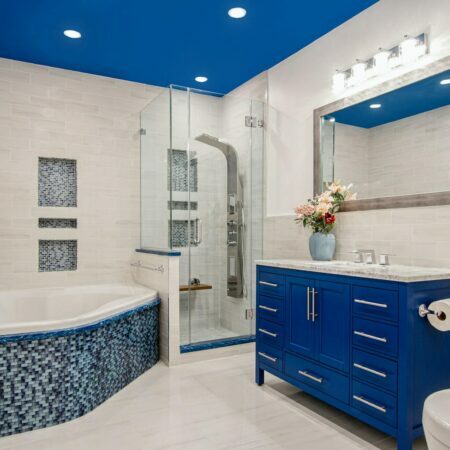 a bathroom with a shower and a sink